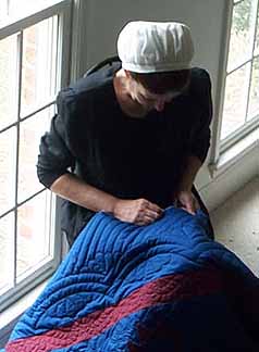 Handquilten door een Amish-vrouw - Handwerkwereld
